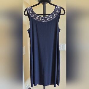 Onyx Nite Navy Dress with Embellished Neckline And Layered Back.